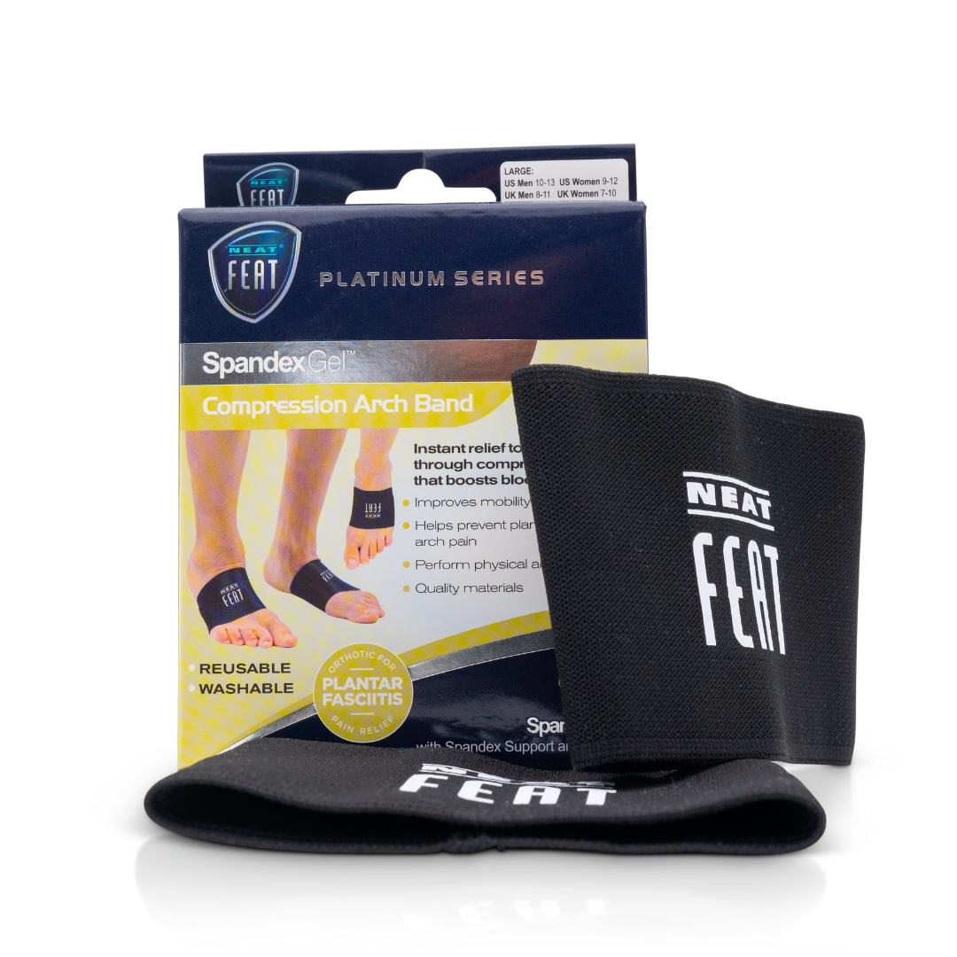 Platinum Series Spandex Gel Compression Arch Band. The image shows the mostly blue and yellow box with a demonstration of the product on the front (a foot wearing the product). Two black bands with a white logo are placed in front of the box, one standing upright and the other lying down.